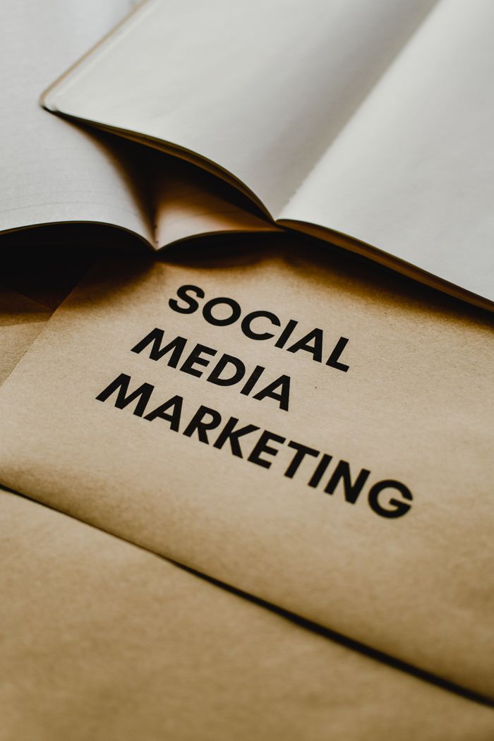 about-us-02 Close-up of brown envelopes with Social Media Marketing text, ideal for startup themes.